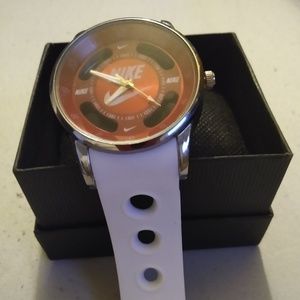 Red and white mens Nike sports watch